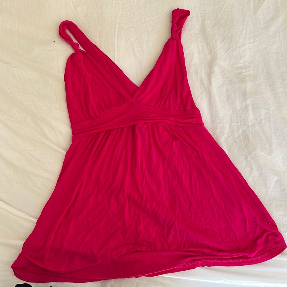 Cute pink tank camisole with knotted detail and crisscross back